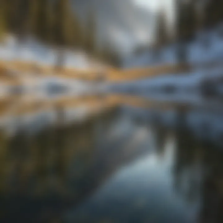 Reflection of snow-capped mountains in the crystal-clear waters of Yellowstone River