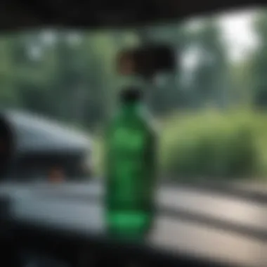 Interior view of a vehicle with peppermint oil bottle on the dashboard